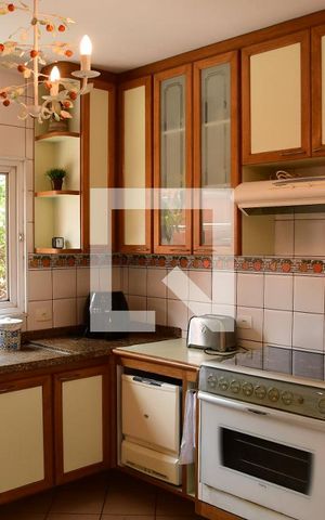 Casa de condomínio para alugar com 315m², 3 quartos e 6 vagasCozinha
