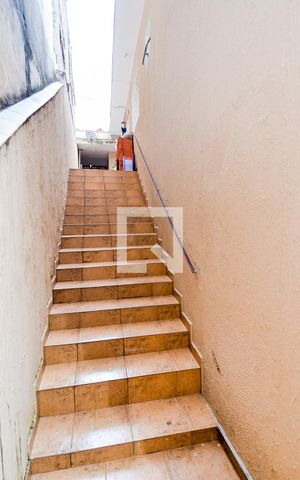Casa à venda com 120m², 2 quartos e 2 vagasEscada da Área da Churrasqueira