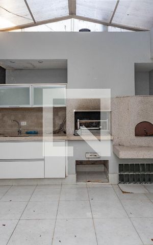 Casa à venda com 405m², 4 quartos e 4 vagas Casa à venda com 405m², 4 quartos e 4 vagasCozinha
