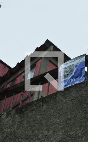 Apartamento à venda com 60m², 2 quartos e 1 vagaPlaquinha instalada na fachada do condomínio