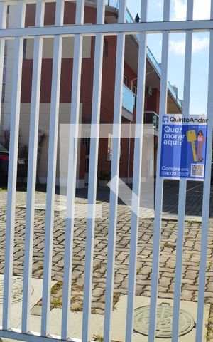 Casa de condomínio à venda com 90m², 3 quartos e 1 vagaPlaquinha instalada na fachada do condomínio