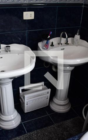 Casa de condomínio para alugar com 379m², 4 quartos e 4 vagasBanheiro da Suíte