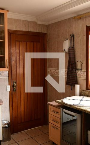 Casa de condomínio para alugar com 379m², 4 quartos e 4 vagasCozinha
