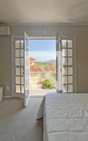 Casa de condomínio à venda com 300m², 4 quartos e 2 vagasVista para o Guaiba da Suíte