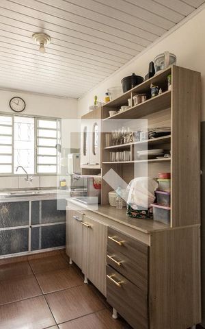 Casa à venda com 230m², 7 quartos e 2 vagas Casa à venda com 230m², 7 quartos e 2 vagasCozinha e Área de Serviço