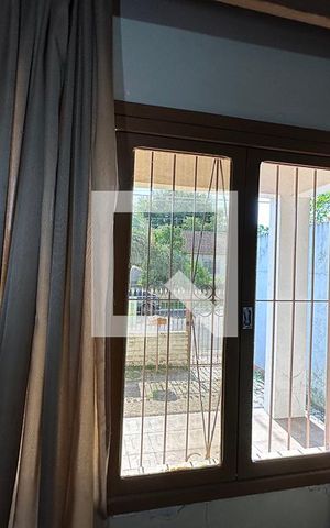 Casa à venda com 140m², 3 quartos e 2 vagasSala de Estar - Janela