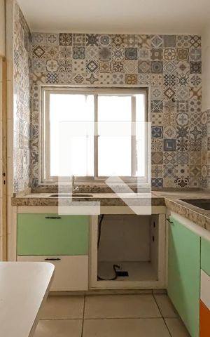 Apartamento à venda com 49m², 2 quartos e 1 vaga Apartamento à venda com 49m², 2 quartos e 1 vagaCozinha e Área de Serviço