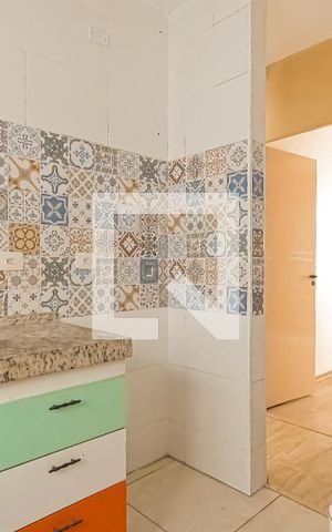 Apartamento à venda com 49m², 2 quartos e 1 vaga Apartamento à venda com 49m², 2 quartos e 1 vagaCozinha e Área de Serviço