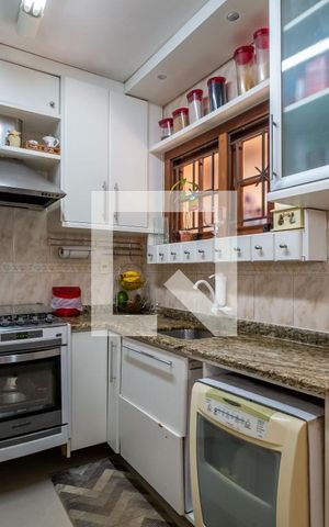 Casa de condomínio à venda com 242m², 4 quartos e 2 vagas Casa de condomínio à venda com 242m², 4 quartos e 2 vagasCozinha