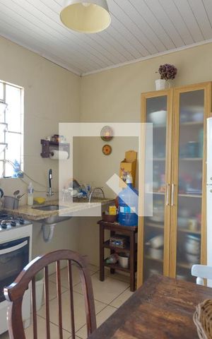 Casa à venda com 180m², 4 quartos e 4 vagas Casa à venda com 180m², 4 quartos e 4 vagasCozinha