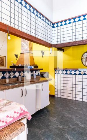 Casa para alugar com 200m², 2 quartos e 20 vagasSalaCozinha