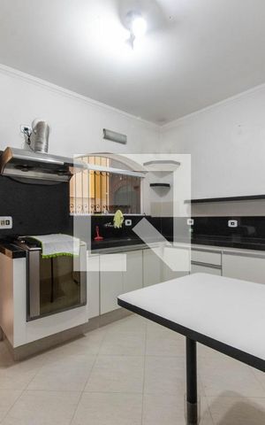 Casa à venda com 200m², 4 quartos e 4 vagas Casa à venda com 200m², 4 quartos e 4 vagasCozinha