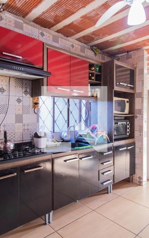Casa à venda com 60m², 3 quartos e 2 vagas Casa à venda com 60m², 3 quartos e 2 vagasCozinha