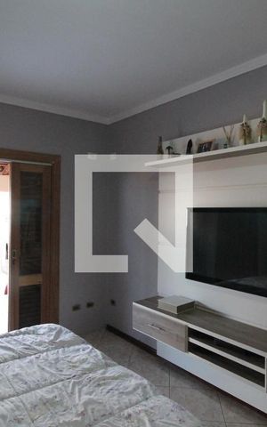 Casa à venda com 200m², 4 quartos e 2 vagasQuarto Suíte 1