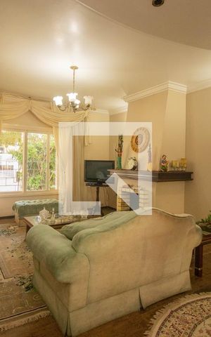 Casa à venda com 218m², 3 quartos e 3 vagasSala de Estar