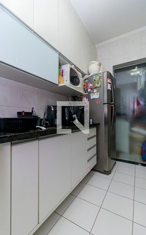 Casa à venda com 75m², 2 quartos e 2 vagas Casa à venda com 75m², 2 quartos e 2 vagasCozinha