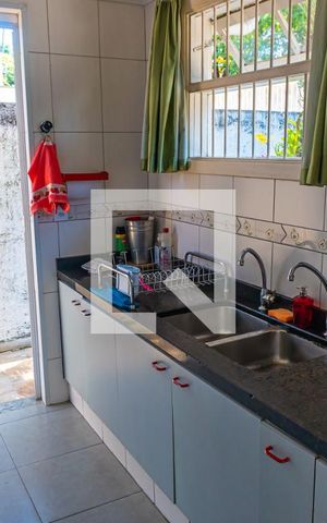 Casa à venda com 380m², 4 quartos e 4 vagas Casa à venda com 380m², 4 quartos e 4 vagasCozinha