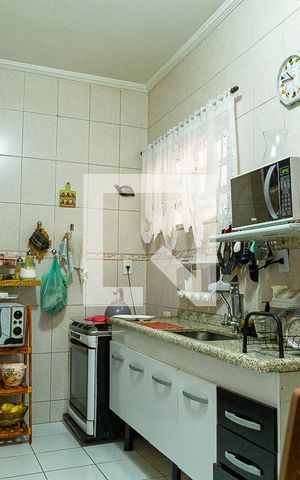 Casa à venda com 110m², 3 quartos e 2 vagas Casa à venda com 110m², 3 quartos e 2 vagasCozinha