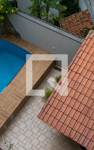 Casa à venda com 540m², 4 quartos e 3 vagas Casa à venda com 540m², 4 quartos e 3 vagasSuíte 2 vista