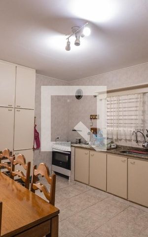 Casa à venda com 200m², 3 quartos e 2 vagas Casa à venda com 200m², 3 quartos e 2 vagasCozinha