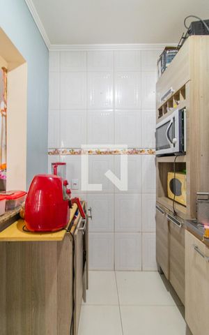 Casa à venda com 110m², 4 quartos e 1 vaga Casa à venda com 110m², 4 quartos e 1 vagaCozinha e Área de Serviço