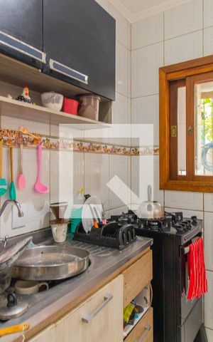 Casa à venda com 110m², 4 quartos e 1 vaga Casa à venda com 110m², 4 quartos e 1 vagaCozinha e Área de Serviço