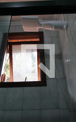 Casa à venda com 386m², 4 quartos e 4 vagasChuveiro banheiro da suíte 2