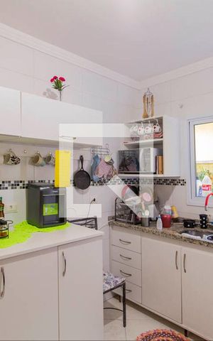 Casa à venda com 110m², 4 quartos e 2 vagas Casa à venda com 110m², 4 quartos e 2 vagasCozinha