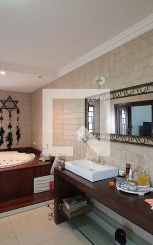 Casa à venda com 640m², 4 quartos e 4 vagasBanheiro da Suite Master