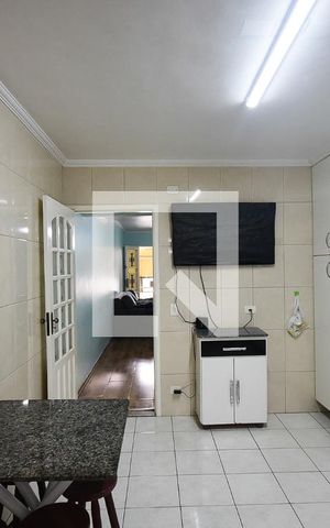 Casa à venda com 147m², 2 quartos e 2 vagas Casa à venda com 147m², 2 quartos e 2 vagasCozinha