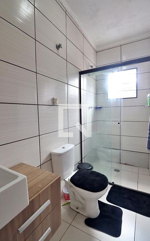 Casa à venda com 108m², 2 quartos e sem vagaBanheiro do Quarto 1 - Suíte