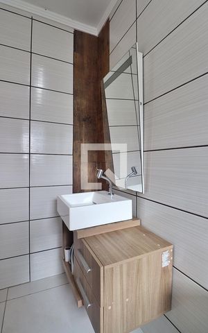 Casa à venda com 108m², 2 quartos e sem vagaBanheiro do Quarto 1 - Suíte