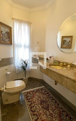 Casa de condomínio à venda com 560m², 4 quartos e 6 vagasLavabo
