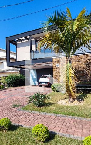 Casa de condomínio à venda com 520m², 4 quartos e 5 vagasFachada