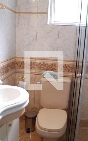 Casa à venda com 330m², 5 quartos e 6 vagasBanheiro da Suíte 2