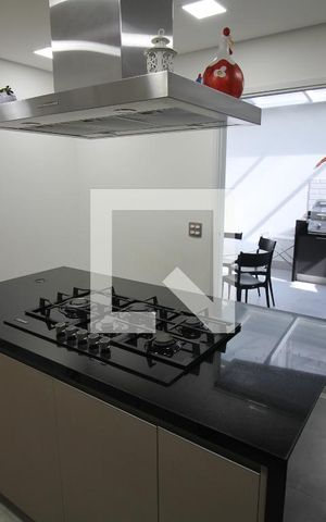 Casa de condomínio à venda com 392m², 4 quartos e 6 vagasCozinha