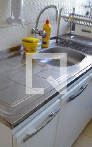 Apartamento à venda com 37m², 2 quartos e 1 vaga Apartamento à venda com 37m², 2 quartos e 1 vagaCozinha e Área de Serviço