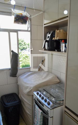 Apartamento à venda com 37m², 2 quartos e 1 vaga Apartamento à venda com 37m², 2 quartos e 1 vagaCozinha e Área de Serviço