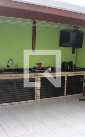 Casa de condomínio à venda com 130m², 3 quartos e 2 vagasEspaço gourmet com lavanderia