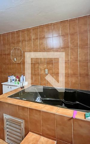 Casa à venda com 330m², 3 quartos e 2 vagasBanheiro da Suíte