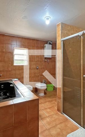 Casa à venda com 330m², 3 quartos e 2 vagasBanheiro da Suíte