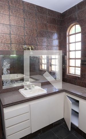 Casa à venda com 577m², 4 quartos e 4 vagasBanheiro da Suíte