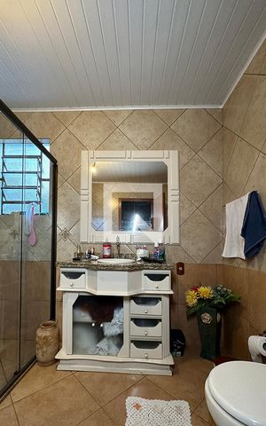 Casa à venda com 120m², 3 quartos e 1 vagaBanheiro 