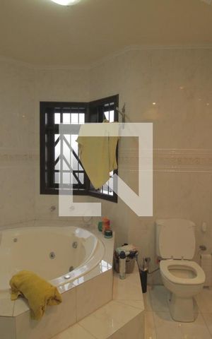Casa à venda com 344m², 3 quartos e 4 vagasBanheiro da Suíte