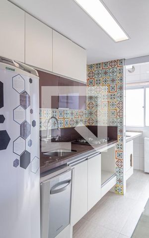 Apartamento à venda com 55m², 2 quartos e 2 vagasCozinha e área de serviço