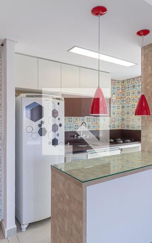 Apartamento à venda com 55m², 2 quartos e 2 vagasCozinha e área de serviço