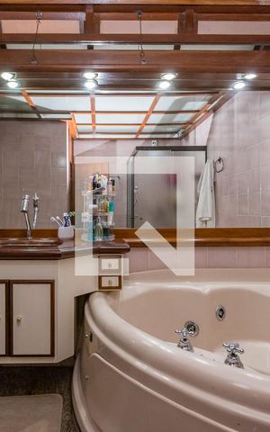 Casa à venda com 450m², 5 quartos e 3 vagasBanheiro da Suíte 2