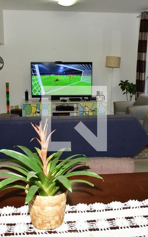 Casa de condomínio à venda com 241m², 4 quartos e 3 vagasSala
