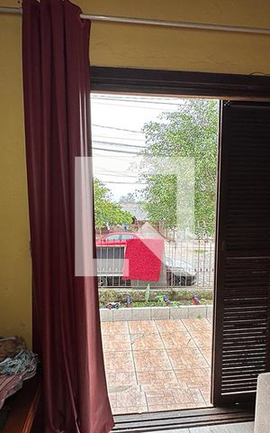 Casa à venda com 120m², 3 quartos e sem vagaPorta Janela da Sala