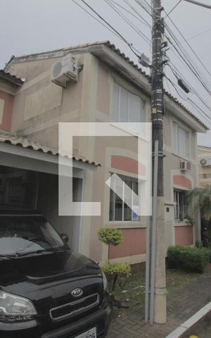 Casa de condomínio à venda com 107m², 4 quartos e 2 vagasFachada da casa